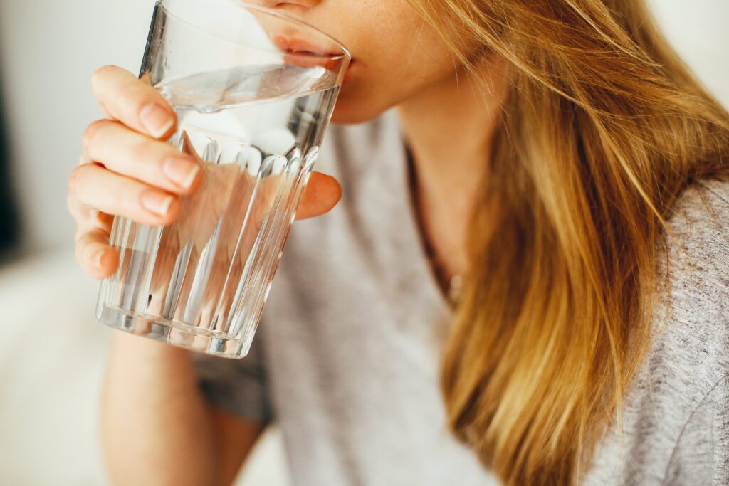 Woman drinking glass of water